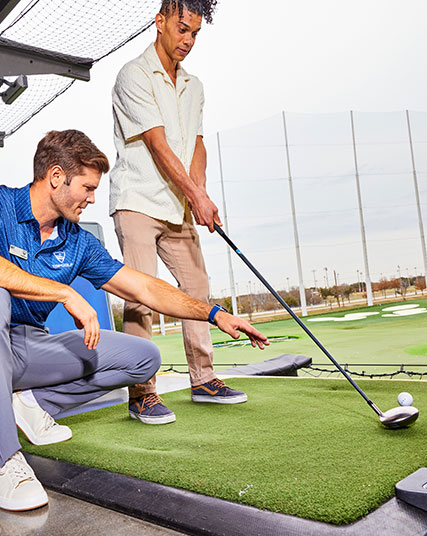 Guests connecting in a social space at Topgolf Riyadh